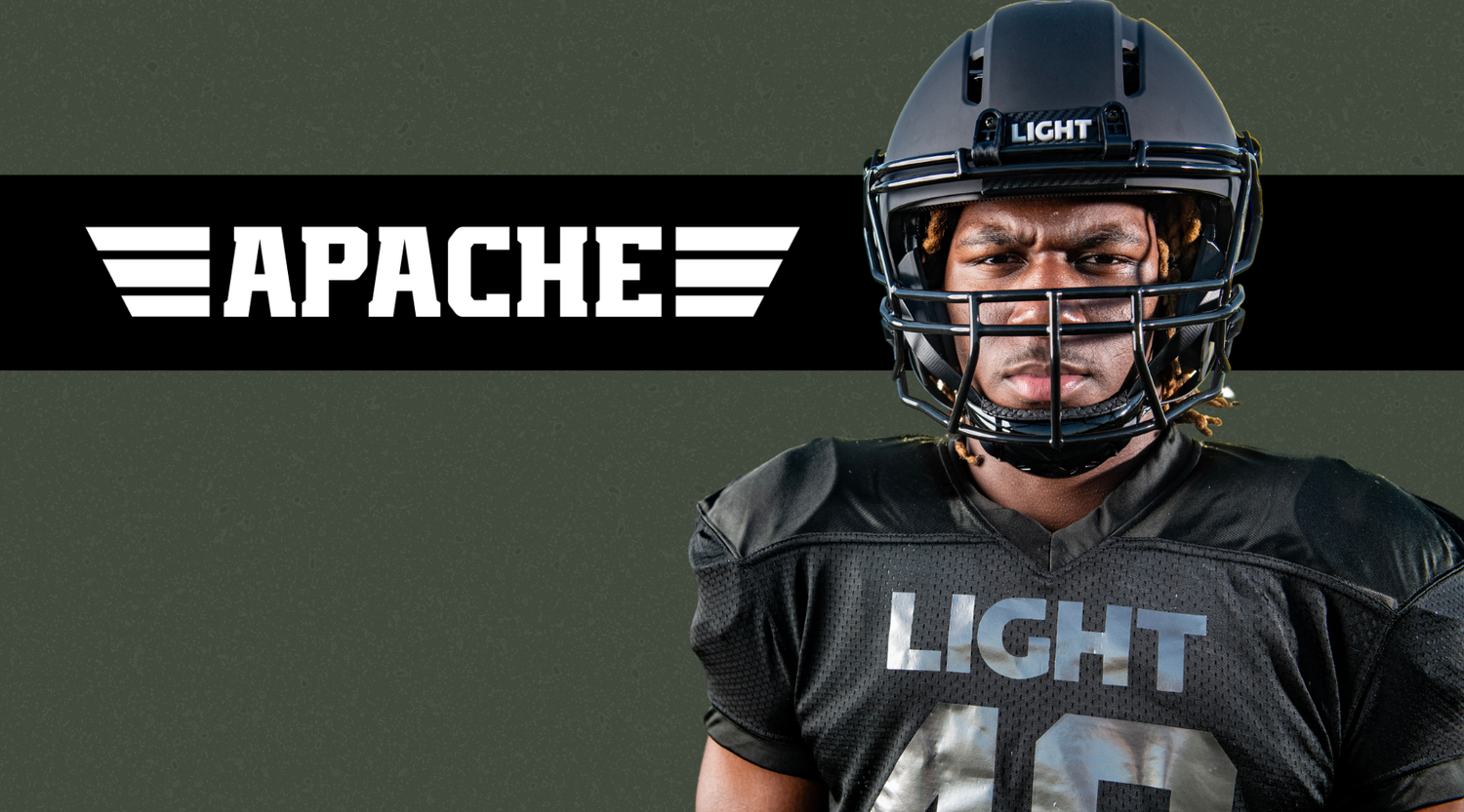 Football player wearing black LIGHT Apache helmet with Apache logo